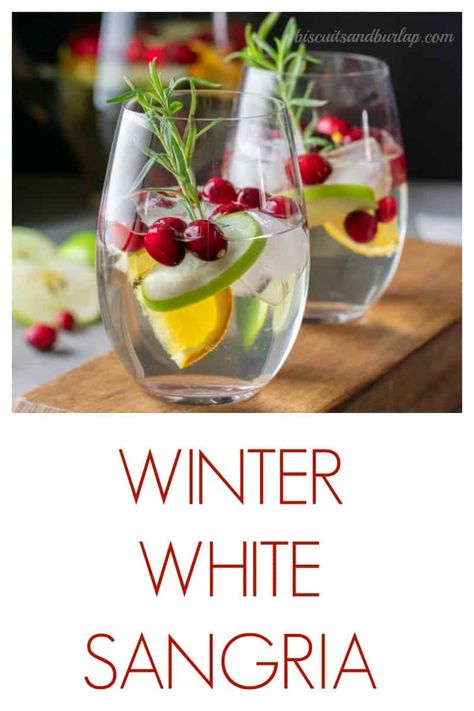 White Sangria features white cranberry juice and makes a perfectly festive lower alcohol libation. Winter White Sangria Recipe, White Cranberry Mocktail, Winter White Sangria, Christmas Sangria Recipes Easy, White Cranberry Sangria, Beach Beverages, White Christmas Sangria, Christmas Beverages, Soup Party