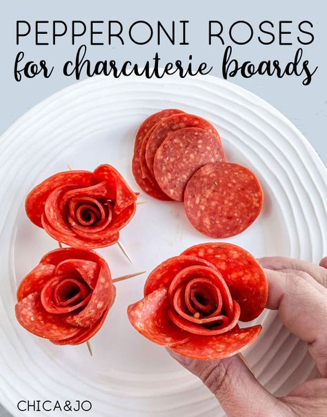 Easily make pepperoni roses to include in a charcuterie board. How To Make Roses Out Of Pepperoni, Kentucky Charcuterie Board, Rose Out Of Pepperoni, How To Make Flowers For Charcuterie, Pepperoni For Charcuterie, How To Make Charcuterie Roses, How To Make A Rose Out Of Pepperoni, Pepperoni And Cheese Charcuterie Board, Charcuterie Board Pepperoni Rose