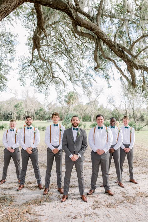 Sage And Gold Groomsmen, Guys Wedding Attire, Green And Tan Groomsmen, Groomsmen Attire Beige And Green, Groomsmen Tan Suit Green Tie, Groomsmen Olive Green Tie, Sage Green Wedding Groomsmen Jeans, Groomsmen Attire Suspenders, Dark Grey Groomsmen