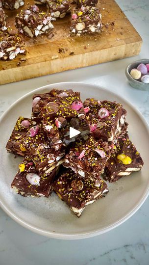 470K views · 1.7K reactions | Mini Egg Rocky Road 🐣 🍫 | #AD Mini Egg Rocky Road | An irresistible sweet treat and ideal way to use up any leftover chocolate or treats you have after Easter! 🐣 🍫 Ingredients... | By Donal Skehan | Anytime I've ever mentioned
leftover chocolate around Easter time everyone says oh
there's no leftover Easter chocolate in my house. Well
this is the recipe for mini egg Rocky Road so it uses up any
leftover Easter egg chocolate even though you say you don't
have it. Someone's going to have leftover chocolate. So
your Rocky Road mixture is essential. You've got butter,
golden syrup, chocolate gets added and you melt that
through. Ooh look at that. Now we're going to put in your dry
ingredients. You've got rich tea biscuits, digestive
biscuits, mini marshmallows Marshmallow Tea, Cake Marshmallow, Easter Egg Chocolate, Broken Biscuits, Rocky Road Chocolate, Rich Tea Biscuits, Donal Skehan, Egg Chocolate, Bake Cake