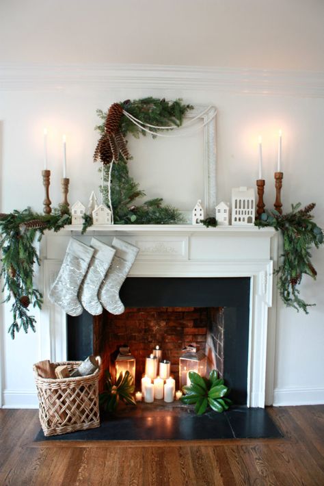 Empty Fireplace Ideas, Deco Nouvel An, Fireplace Baskets, White Brick Fireplace, Large Pillar Candles, Chic Christmas Decor, Candles In Fireplace, Frame Christmas, Christmas Fireplace Decor