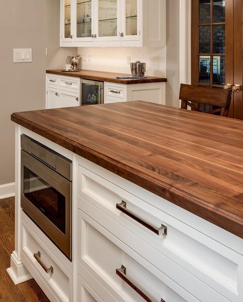 Sharer Design Group on Instagram: “Wood counter tops are a great way to bring warmth to any kitchen. Currently reminiscing on this stunning Walnut counter top. • •…” Wooden Kitchen Counter Tops, Kitchen With Dark Wood Countertops, Cherry Wood Countertops, Wooden Kitchen Countertops Modern, Dark Wood Kitchen Countertops, Wood Countertops White Cabinets, Kitchen With Wooden Countertops, Wood Backsplash Kitchen, Wooden Kitchen Counter