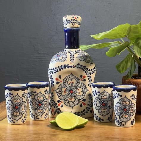 PRICES MAY VARY. HANDCRAFTED IN MEXICO - These unique CERAMIC pieces are handmade and hand-painted in the traditional talavera style in the heart of Mexico by skilled artisans. Each set comes with a ceramic tequila decantor and 4 ceramic tequileros (shot glasses) UNIQUE TEQUILA GIFT SET - Painted entirely by hand each liquor decanter and tequila sipping glasses contain small variations making it a one of a kind gift for tequila drinkers. Included in each set is a card signed by the artisan that Tequila Glasses, Tequila Gifts, Liquor Decanter Set, Townhouse Kitchen, Honey Store, Bottle Projects, Tequila Gift, Tequila Tasting, Glasses Unique