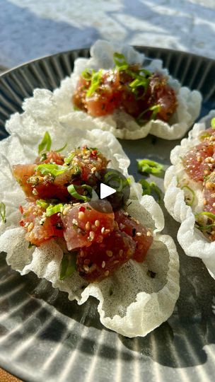 50K views · 2.1K reactions | Rice Paper Chips! ✨I could snack on these all day long - they’re really yummy and super fun to make! Rice paper is lightly fried then served with some poke 🍣 Get the recipe below‼️

INGREDIENTS 🐟 
Rice paper, cut into quarters
Poke, store-bought or homemade
Neutral oil, for frying
Green onion, garnish
Furikake, garnish 

INSTRUCTIONS 📝 
Cut rice paper into quarters and add to hot oil. The oil should be hot enough as the rice paper will crisp up within seconds. Remove from oil shaking off any excess and place onto a paper towel. Top with your fav poke and garnish with green onion & furikake. Enjoy! 

#crispyricepaper #crispyrice #crispyricechips #ricepaperchips #poke #snackideas #asianappetizer #ricepaper #ahitunapoke #asiansnack | steph🍴easy meals + snacks Fried Rice Paper Chips, Frying Rice Paper, Fried Rice Paper Recipes, Rice Paper Chips, Fried Rice Paper, Rice Paper Recipes, Ahi Tuna Poke, Asian Appetizers, Asian Dinner Recipes