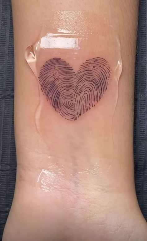 Three Finger Print Tattoo, Tattoo Ideas To Get For Your Girlfriend, Tattoo Heart Fingerprint, Heart Shape Fingerprint Tattoo, Couples Thumbprint Heart Tattoo, Finger Print Heart Tattoo Couple, Two Thumb Print Heart Tattoo, Parent Fingerprint Tattoo, Heart Tattoo With Fingerprint