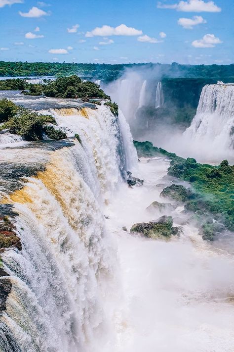 There's no doubt that Iguazu Falls is one of the most breathtaking sights in the world. It has even been named one of the New 7 Wonders of Nature. In this guide you'll find everything you need to know for visiting Iguazu Falls from the Brazilian side and planning a trip of a lifetime to these majestic waterfalls! Iguazu Cataratas | Iguazu Falls photography | Foz do Iguacu | Things to do in Iguazu Falls Brazil | South America bucket list | Brazil bucket list | Things to do in Brazil Iguacu Falls Brazil, Iguassu Falls, Brazil Waterfalls, 7 Natural Wonders, Iguazu Falls, Brazil Travel, Ocean Photography, Nature Reserve, Autumn Photography