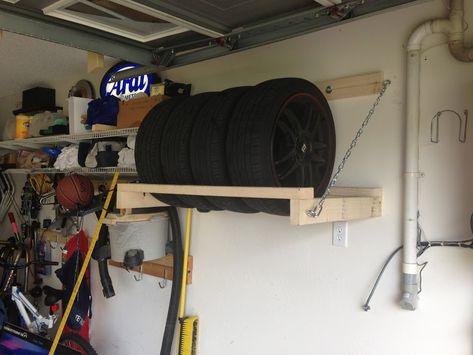 DIY Tire rack. Instructions: http://www.team-integra.net/forum/blogs/morningz/386-diy-garage-wheel-tire-storage-rack.html Tire Storage Rack, Tire Storage, Garage Organization Tips, Garage Organisation, Overhead Garage Storage, Diy Storage Rack, Garage Storage Racks, Tire Rack, Overhead Garage