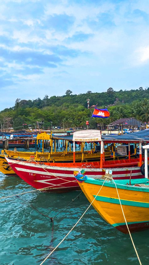 Colourful boats on turquoise blue waters in front of tropical island. Cambodia Koh Rong, Cambodia Travel Aesthetic, Southeast Asia Travel Aesthetic, Backpacking Southeast Asia Aesthetic, South East Asia Travel Aesthetic, Backpacking Asia Aesthetic, Backpacking Aesthetic Asia, South East Asia Aesthetic, Southeast Asia Aesthetic