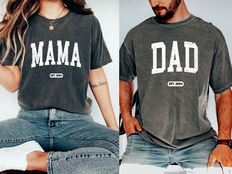 "FREE SHIPPING IN THE US! No order minimum!  Comfort Colors, Mama Established 2024 Shirt, New Dad Shirt, Gift for New Mom, Pregnancy Announcement Shirts, Mom Est 2024, Dad Est 2024 ♥ The SHIRT  * This is a Comfort Colors 1717 shirt.  * This unisex t-shirt is intended to be loose/oversized for women to give a chic and laid back vibe. If you are looking for an oversized \"T-shirt Dress\" look, we recommend sizing up 2-3 sizes.  * Detailed sizing information can be found in the size chart in the photos.  * Printed in the USA. ♥ CARE  ＊Machine wash cold, inside-out, gentle cycle ＊Wash with mild detergent and similar colors ＊Tumble dry low or hang-dry ＊Do not bleach or fabric softeners ＊Do not iron directly onto the design ＊Do not dry clean ♥ PRODUCTION & SHIPPING ＊Each shirt is made to order. Dad Established Shirt, Mom Est 2023, Mom And Dad To Be Shirts, Matching Mom And Dad Shirts, Mom Established Shirt, Mom And Dad Sweatshirts, Mom And Dad Shirts Pregnancy, Mommy To Be Shirts, Dad Shirt Ideas