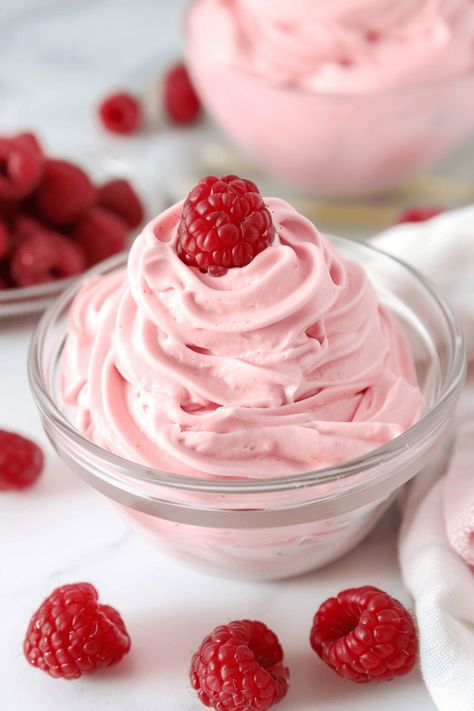 Once you've experienced the joy of raspberry whipped cream, you'll never settle for plain whipped cream again. It's pure magic, and I know you'll love it. Whipped Raspberry Frosting, Raspberries And Cream, Raspberry Whipped Cream Frosting, Fresh Whipped Cream Recipe, Rasberry Filling, Raspberry Cream Filling, Raspberry Whip, Raspberry Whipped Cream, Whipped Cream Desserts