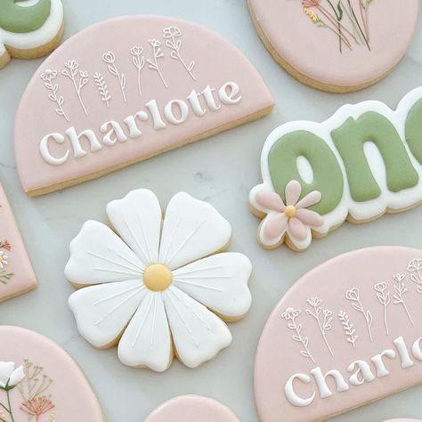 Casey Wilson Puetz on Instagram: "Little wildflower is one! Fun wildflower inspired set for a first birthday party. • • • #sugarcookie #sugarcookies #royalicing #cookiesofinstagram #royalicingcookies #customcookies #sugarcookiesofinstagram #cookiedecorating #decoratedcookies #cookieart #decoratedsugarcookies #sugarcookiedecorating #cookier #cookiedecorator #cookieartist #instacookies #sugarcookieart #birthdaycookies #icingcookies #flowercookies #wildflowercookies" Wildflower Birthday Cookies, November 1st Birthday Girl, Wildflower Cupcakes, Indie Birthday, Wildflower Cookies, Casey Wilson, Wildflower Birthday Party, Wildflower Birthday, Flower Sugar Cookies