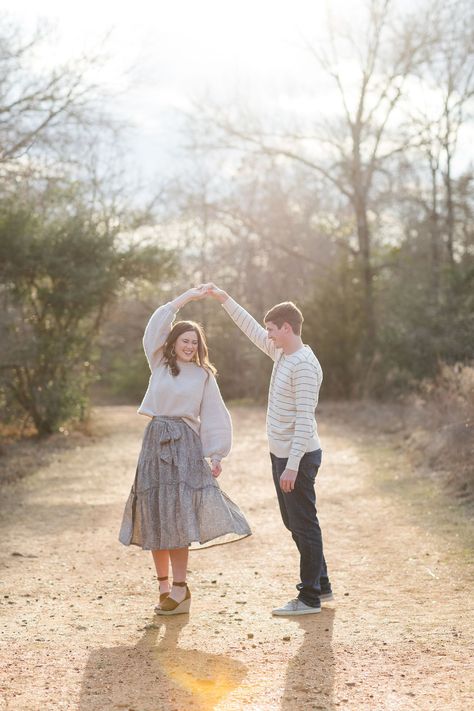 Dancing Couple Photography, Twirling Couple Pictures, Couple Dance Photography Poses, Dancing Photos Couple, Couple Dancing Photo, Spinning Engagement Photo, Park Couple Poses, Dancing Photography Couple, Couple Poses Photography Park