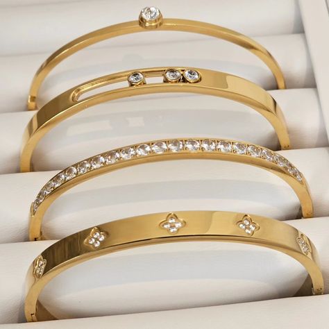 Can you spot our newbie? Our gorgeous moving diamond bangle (second one from top) features three moving diamonds, super elegant! 🔎 jewellery, gold jewellery, elegant jewellery, elegant outfit, classy outfits, modest wear, modest fashion, modest outfits, stacking bangles, tarnish free jewellery, waterproof jewellery Jewellery Elegant, Stacking Bangles, Elegant Jewellery, Fashion Modest, Elegant Outfit Classy, Outfit Classy, Outfits Modest, Jewellery Gold, Stacked Bangles