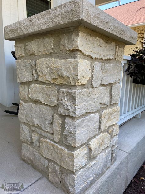 Oakfield Stone's Prairie Stonegate 100% splitface, machine cut veneer. This ashlar natural stone is a dolomitic limestone quarried by Oakfield Stone Company near Beaver Dam, Wisconsin. The primary color is a buff, light tan and brown with occasional light blue/gray course layers. Rock Pillars Columns, Stone Pillars Driveway Entrance, Stone Pillars Porch, Outdoor Pillars, Stone Pillars Columns, Porch Post Ideas, Diy Stone Veneer, Stone Front House, House Pillars