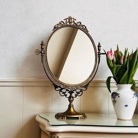 Vintage Huge Swivel Mirror, Vanity Mirror, Adjustable Table Mirror, French Mirror, Free-Standing Mirror, Rare Find. with a beautiful age and an authentic patina that is highlighting the ornate details, this is the perfect makeup mirror, has pivots in the middle, and can turn 180 degrees, to achieve the perfect angle and light. An elegant vintage French brass vanity mirror in Art Nouveau style. The mirror can be tilted with key-shaped screws on either side. The mirror stands on an oval base with Gold Standing Mirror Vintage, Vintage Desk Mirror, Brass Vanity Mirror, Vintage Vanity Mirror, Swivel Mirror, Random Object, Turquoise Table, Brass Vanity, Huge Mirror