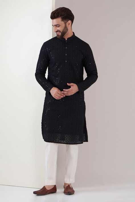 Black georgette kurta with mandarin collar, all over floral geometric pattern, tonal chikankari thread and water sequin embroidery. Paired with white straight fit pants. Components: 2 Pattern: Embroidered Type Of Work: Chikankari Thread and Sequin Work Neckline: Mandarin Collar Sleeve Type: Full Sleeves Fabric: Georgette Color: Black Other Details:  Side slits on kurta Kurta Closure: Front button placket Occasion: Sangeet - Aza Fashions Fancy Kurta For Men, Kurta Set Men, Wedding Kurta For Men, Black Kurta, Kurta Men, Kurta Set For Men, White Kurta, Black Pants Men, Straight Fit Pants