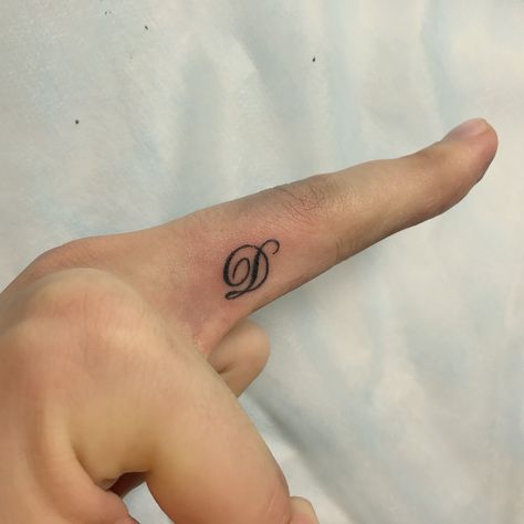 D Name Tattoo Design, D Alphabet Tattoo, D Finger Tattoo, Letter D Tattoos Initials Small, The Letter D Tattoo, Letter D Finger Tattoo, Small D Tattoo Letter, Dhruv Name Tattoo, Tattoo Of Initials