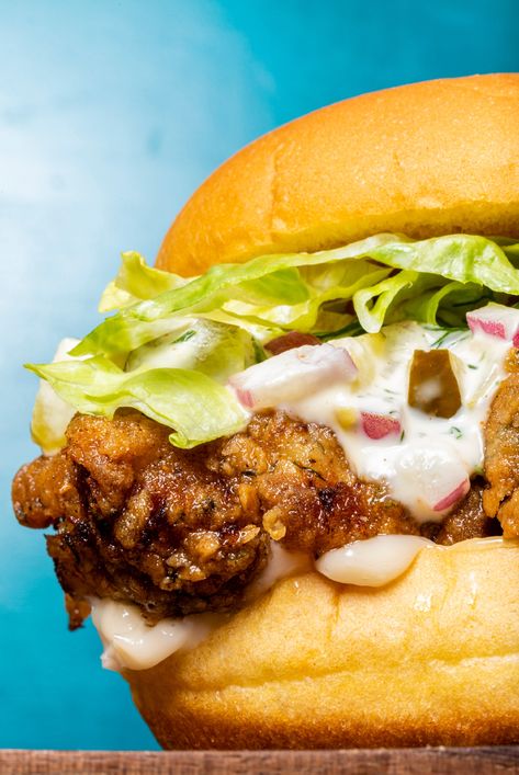 Pickle-Brined Fried Chicken Sandwiches Fried Chicken Thigh Sandwich, Pickle Brine, Fried Chicken Sandwiches, American Test Kitchen, Local Fast Food, Cooks Country Recipes, Crispy Chicken Sandwiches, Donut Toppings, Cookie Toppings