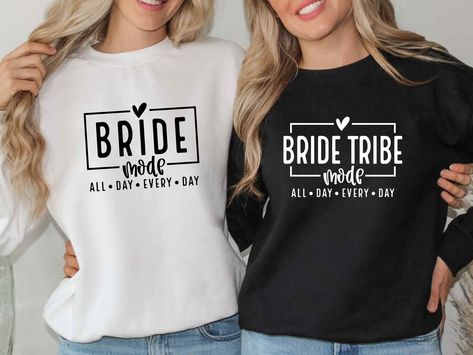 Sweatshirts are sold separately. Bride and Bride Tribe Sweatshirt, Bachelorette Party Crewneck, Bridal Shower Sweater, Hen Party Gift, Bride Team Sweatshirt, Future Bride  BELLA CANVAS SWEATSHIRT - 52% airlume combed and ringspun Cotton; 48% Polyester for solid colours. - 60% airlume combed ringspun cotton ,  40% polyester for heather colours. - Soft feel fabric. - Drop shoulder style. - Outer fabric: 100% Cotton (3 layer fabric). - Weight: 280 gsm. GILDAN SOFT STYLE SWEATSHIRT(Midweight Sweatshirt) -80% Ringspun Cotton, 20% Polyester. -Drop Shoulder Style -Classic Fit. -Ribbed Collar, Cuff and Hem with spandex. Care: - Warm wash, inside out. - Do not tumble dry. - Do not bleach. - Do not dry clean. - Do not iron the printed part directly. Team Bride Ideas, Sweatshirt Bachelorette, Bride Team, Hen Party Gifts, Team Sweatshirts, Creative T Shirt Design, Style Sweatshirt, Future Bride, Bride Tribe