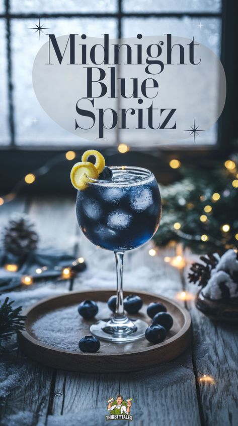 "Discover the vibrant Midnight Blue Spritz Cocktail, a sparkling blue drink perfect for parties! This elegant blue spritz drink combines the refreshing flavors of blue curaçao and Aperol, creating a stunning nighttime blue spritz that's sure to impress. Perfect for gatherings or a cozy night in, this Midnight Blue Cocktail is a must-try. Elevate your cocktail game with this easy Blue Spritz Drink Recipe and enjoy the delightful taste of summer in every sip!" Star Themed Cocktail, Starry Night Theme Drinks, Blue Batch Cocktails, Themed Cocktail Night, Dark Blue Cocktails, Acotar Themed Drinks, Blue Cocktails Recipe, Masculine Cocktails, Alcoholic Drinks Blue