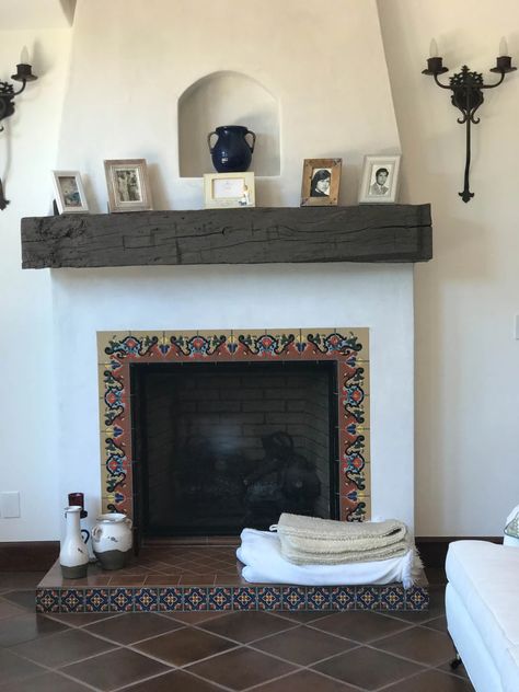 Fireplace Tile Edge, Fireplace Ideas Spanish Style, Mexican Tile Fireplace Surround, Spanish Inspired Fireplace, Spanish Stone Fireplace, Fireplace With Spanish Tile, Hacienda Fireplace Ideas, New Mexico Fireplace, Saltillo Tile Fireplace