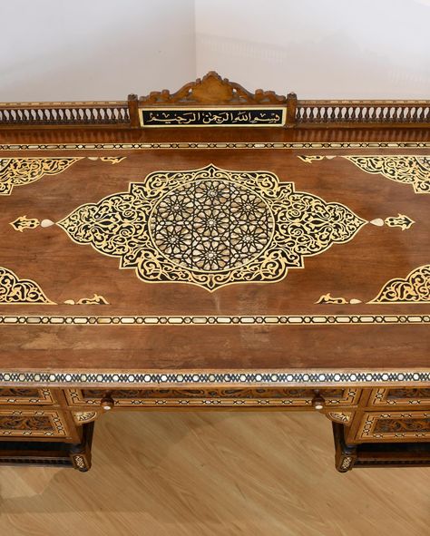 Holy mother of pearl 💎 Moorish walnut and mother of pearl inlay desk with carved wood gallery top, Arabic calligraphy to front and back, carved drawers and sides, and two galleried shelves to bottom, made in Egypt. Some finials missing. Dimensions: 41”H x 59”W x 31”D. Available online and in store. Eligible for nationwide shipping through our website. 🦎saltlizardnyc.com Mother Of Pearl Inlay, Pearl Inlay, Carved Wood, Finials, Mother Of Pearl, Egypt, Walnut, Arabic Calligraphy, Calligraphy