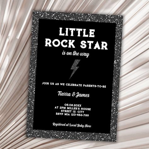 Looking for the perfect baby shower invitation to rock your world? This rock and roll theme baby shower invitation featuring a black glitter background and glitter flash, is sure to catch your eye. With the fun and playful sentence "little rockstar is on the way", your guests will know they're in for a party like no other. This invitation is perfect for parents who want to celebrate their future little musician with an edgy and exciting theme. Order now and get ready to rock! Rock And Roll Engagement Party, Rock N Roll Gender Reveal, Rockstar Baby Shower Ideas, Skater Baby Shower Ideas, Punk Rock Baby Shower Ideas, Rock And Roll Invitations, Rock A Bye Baby Shower Theme, Born To Rock Baby Shower Ideas, Rock N Roll Baby Shower Ideas