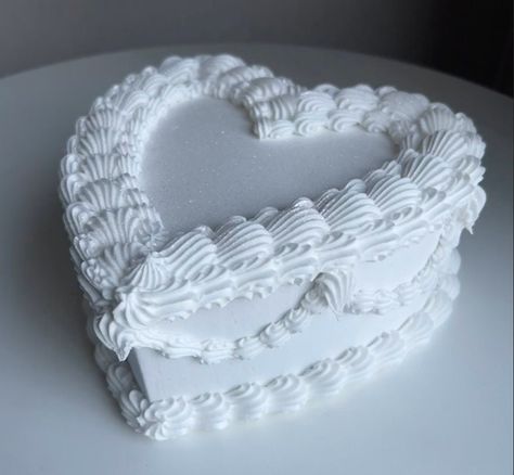 "This cake is perfect for photo shoots, coffee table art, and can even be hung on a wall! This is a smallest size I offer. Length: 7 1/2\" Width: 7 1/2\" Height: 3\" However this will vary due to the frosting. Please only clean with compressed air for dusting. If you are interested in a real version of this cake, please visit us on instagram @ maryscakeslv. We are local to Las Vegas only for real baked goods.  Products used: lightweight spackle, acrylic paint, cardboard.  Disclaimer: Because these are made to order, colors may vary slightly as they are all hand mixed. No returns or cancellations." White Heart Cake, Destination Wedding Bags, Paint Cardboard, Heart Shaped Wedding Cakes, Charm Display, Coffee Table Art, Prop Cake, Display Cake, Fake Food Props