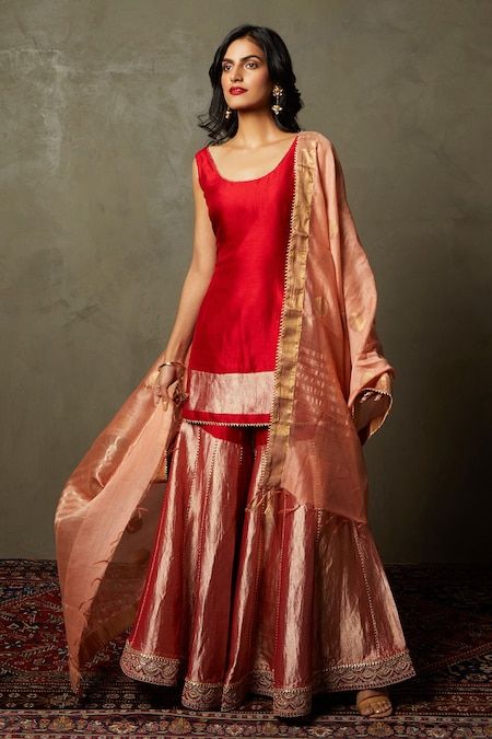 Buy Red Silk Embroidered Scalloped Round Christin Kurta Gharara Set For Women by RI.Ritu Kumar Online at Aza Fashions. Red Color Suit Design, Desi Look Outfits, Round Neckline Designs, New Traditional Dress Design, Red Contrasting Colors, Kurti Ideas, Sleeveless Kurta, Trendy Outfits Indian, Indian Outfits Lehenga