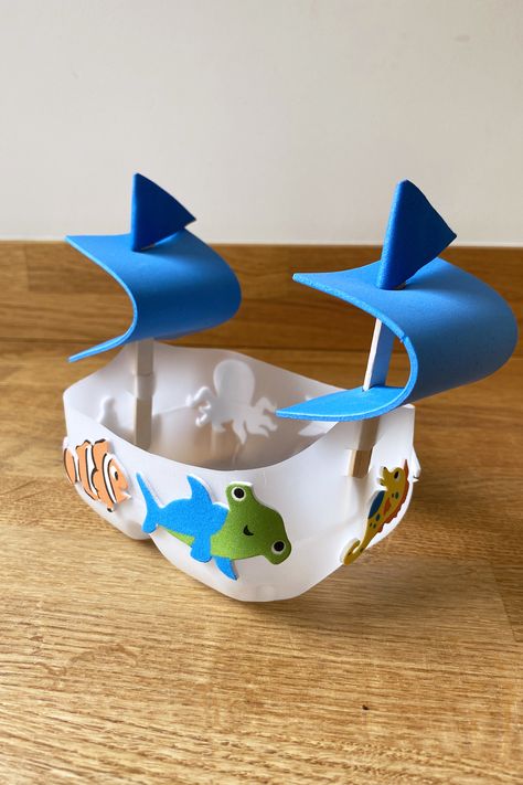 Floating boat craft for toddlers, preschoolers and young children. Recycled Boat Craft Kids, Make A Boat For Kids That Floats, Homemade Boats For Kids That Float, How To Make A Boat That Floats For Kids, Floating Boat Craft, Boat Projects For Kids, Boat Art Preschool, Diy Boats For Kids That Float, Diy Boat For Kids That Float