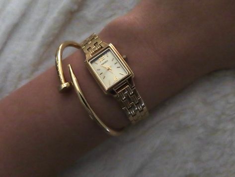 Dainty gold watch, rectangle watch, gold seiko watch, gold watch, gold jewelery, cartier nail bracelet, nail bracelet, gold nail bracelet, gold stack, gold watch and bracelet, watch aesthetic Cartier Rectangle Watch, Womens Small Gold Watch, Gold Dress Watch, Womens Rectangle Watches, Dainty Square Watch, Women’s Rectangle Watch, Delicate Gold Watch Women, Gold Square Watches Women, Cartier Bracelet Nail