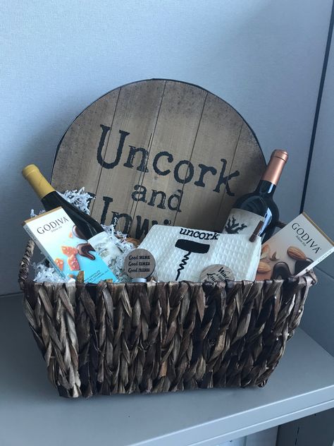 Uncork and Unwind gift basket of wine and chocolate. Perfect for wine lovers! #winegift #DIYgifts Wine And Coffee Gift Basket, Thank You Wine Gift Basket Ideas, Thank You Wine Basket, Wine Night Basket, Wine Baskets For Raffles Fundraisers, Wine Lover Gift Basket, Silent Auction Wine Basket Ideas, Wine Prize Basket, Wine Basket Ideas Raffle