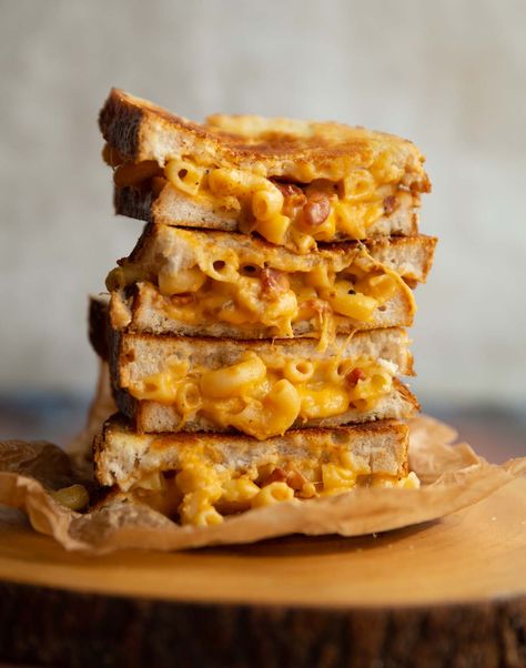 If you've never eaten mac and cheese between two slices of bread you haven't quite lived. This grilled cheese is loaded with the most delicious mac and cheese imaginable! #macandcheese #grilledcheese #cheese | www.somethingaboutsandwiches.com Mac And Cheese Grilled Cheese, Delicious Mac And Cheese, Sausage Sandwich Recipes, Grilled Mac And Cheese, Gourmet Mac And Cheese, Cheese Mac And Cheese, Gourmet Grilled Cheese, Sausage Sandwiches, Garlic Cheese Bread