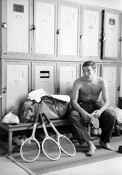 Italian tennis player Nicola Pietrangeli in the locker room. 1956 Nicola Pietrangeli, Tennis Academy, Shooting Bags, Indoor Tennis, Vintage Lockers, Shooting Sports, Figure Photography, Giclee Painting, Tennis Clubs