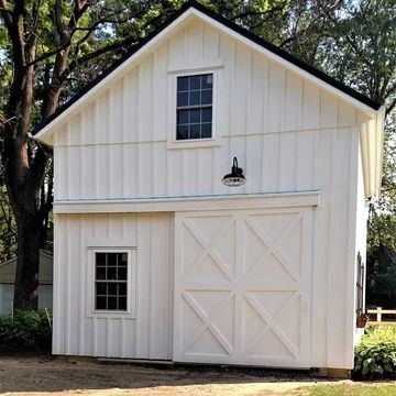 Windows With Grids, Garage Workshop Ideas, Board Batten Siding, Detached Garage Designs, Farmhouse Sheds, Sliding Garage Doors, Shed Designs, Pole Barn Garage, Garage Plans Detached