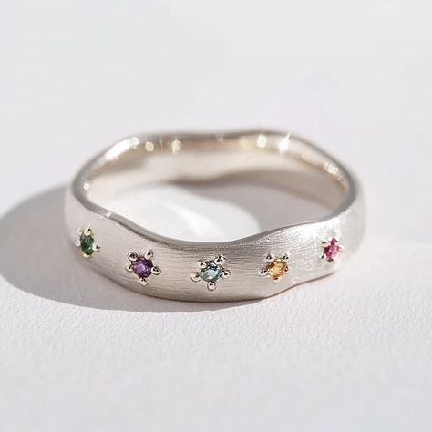 Catch the summer waves with this colorful stunner 🌊✨ White gold + vibrant gems Unique Wedding Bands For Women Silver, Unique Wedding Bands For Women, Golf Wedding, September Birthstone Ring, 14k Gold Wedding Band, September Birthstone Rings, Unique Wedding Bands, Ring Ideas, Ancient Jewelry