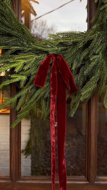 Red Modern Christmas Decor, Christmas Garland Front Porch Railing, Velvet Ribbon On Wreath, Regency Christmas Aesthetic, Cottage Christmas Aesthetic, Red Velvet Ribbon Christmas, Mckenna Barry, Christmas Hangout, Christmas Arches