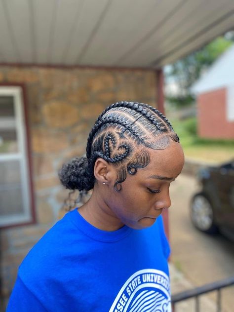 Braid Back Bun Black Women, All Back Conrow With Heart, 5 Stitch Braids In A Bun, Straight Back Cornrows With Bun, Straight Backs Feed Ins Into Two Buns, Stitch Braids Into Bun With Heart, Feed In Braids With Bun In Back, 8 Feed In Braids With Designs, Straight Backs In A Bun