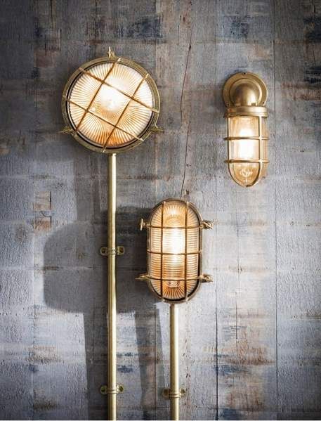 Inspired by lighting found on naval ships, the Devonport Bulk Head Light is vintage and iconic in style. The oval shape with ribbed glass design offers a stunning expanse of light to your surroundings. The fitting could be positioned next to a doorway, spaced around the exterior of the home or in the potting shed giving you that much needed light. The name derives from the well-known naval base of Devonport in Plymouth, a name we found quite fitting for our new collection. The heavy Brass exteri Urban Homes, Bulkhead Light, Industrial Wall Lights, Down Light, Industrial Wall, Head Light, Outdoor Wall Lights, Contemporary Bathroom, Antique Finish