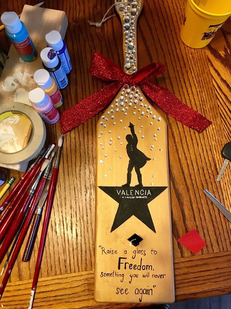 Hamilton Themed Graduation Sorority Paddle | grad | red and gold | rhinestones| greek life Creative Sorority Paddles, 21 Paddle, Paddle Sorority Big, Paddles Sorority, Paddle Ideas, Delta Gamma Sorority, Greek Paddles, Big Little Basket, Skee Wee