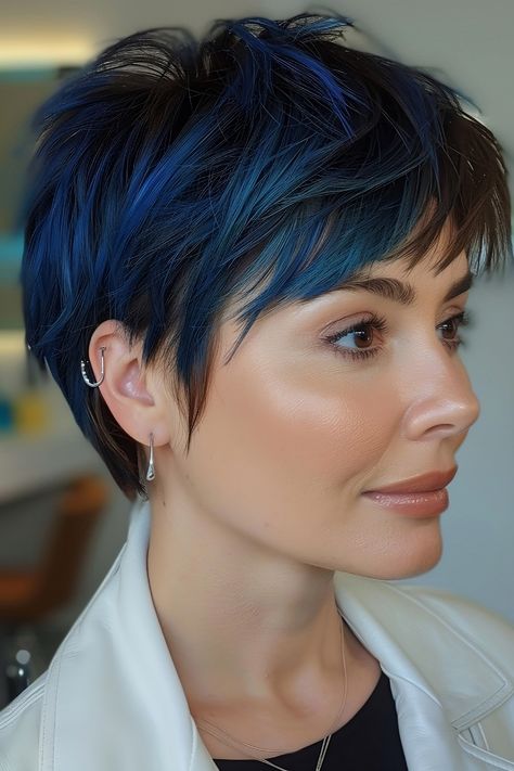 The Best Pixie Haircut Ideas of 2024 Electric Blue Highlights, Pixie Haircut Color, Trendy Pixie Haircut, Pixie Color, Bixie Haircut, Long Haircuts With Bangs, Classic Pixie, Pixie Haircut Ideas, Dreamy Style