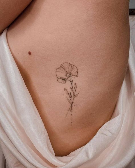 Feminine Tiny Poppy Flower Tattoo Common Poppy Tattoo, Poppy Tattoo On Ribs, Poppy Flower Hip Tattoo, 3 Poppy Flower Tattoo, Four Flower Tattoo, Poppy Side Tattoo, Blooming Poppy Tattoo, Poppy Behind The Ear Tattoo, Poppy Flower Rib Tattoo