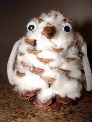 Snowy Owl craft using a pine cone and cotton balls-- a fun craft to do with little kids! Snowy Owl Craft, Welcome Winter, Cones Crafts, Owl Crafts, Pine Cone Crafts, Cotton Balls, Snowy Owl, Childrens Crafts, Nature Crafts