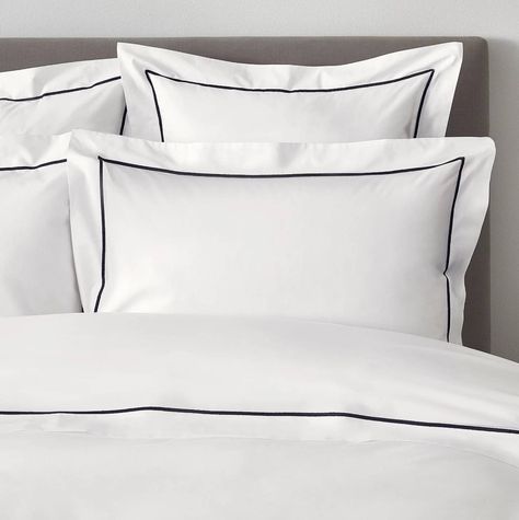 [link url="https://www.thewhitecompany.com/uk/Savoy-Bed-Linen-Collection/p/savoy-bed-linen-collection?swatch=White/Navy#"]Savoy Bed Linen Collection[/link], starting at £25 from The White Company. Made from 400-thread-count Egyptian cotton, the Savoy collection comes with a choice of coloured trims, from plain white to silver and navy. It's made in Portugal and looks super smart. [button url=""]Shop now[/button] Hotel Collection Bedding, Grey Linen Bedding, Bed Linen Design, White Linen Bedding, Bedding Sets Online, Designer Bedding Sets, Linen Collection, Buy Bed, Luxury Bedding Sets