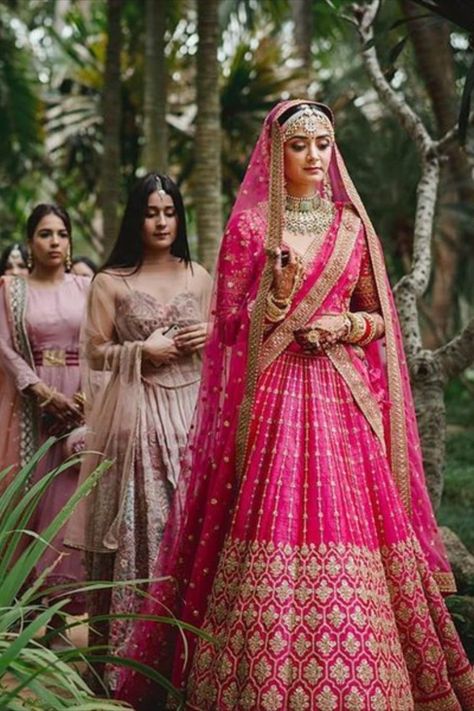 All you beautiful Brides to-be!! Tired of seeing the same old red lehenga ? Want to try something Different yet Traditional? Check out these Magenta Bridal Lehenga that would make you look exceptionally pretty at your Wedding. #indianwedding #shaadisaga #intimatewedding #lehenga #bridallehenga #weddingoutfits #indianweddingtrends #magentalehenga #indianbridal #bridalfashion #indianweddinginspiration Lahga Design Bridal Lehenga, Bridal Lehenga Unique Colour, Magenta Wedding Lehenga, Wedding Ghagra Brides, Magenta Lehenga Bridal, Pink Bridal Lehenga Brides, Bride Lehenga Indian Pink, Dark Pink Lehenga Bridal, Hot Pink Bridal Lehenga Wedding