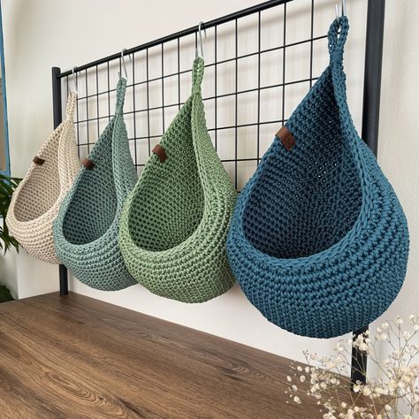 "These hanging wall baskets are ideal for rustic kitchen decoration. You can save space in your kitchen with hanging storage baskets. It is the perfect solution for storing your fruits and vegetables. It is made of polypropylene yarn. These baskets do not contain chemicals harmful to health. Extremely durable baskets are also decorative. You can use it not only in the kitchen but everywhere in your home. You can organize your supplies in the bathroom, basement, pantry and more. You can also use Hanging Fruit Baskets Kitchen, Hanging Vegetable Basket Kitchen, Kitchen Wall Baskets, Yarn Wall Storage, Hanging Vegetable Basket, Shelves On The Wall, Basement Pantry, Hanging Storage Baskets, Hanging Baskets Kitchen