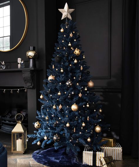 10 Christmas tree themes – festive trends for 2021 | Real Homes Black Christmas Tree Decorations, Blue Christmas Tree Decorations, Blue Christmas Decor, Creative Christmas Trees, Blue Christmas Tree, Christmas Themes Decorations, Black Christmas Trees, Christmas Tree Inspiration, Christmas Living Rooms