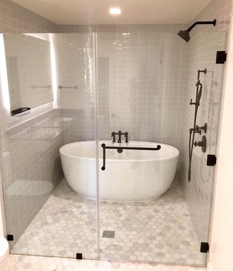 Walk-in shower with tub inside and bronze hardware Shower In Tub Ideas, Shower And Tub Walk In, Bathroom Tubs And Showers, Bath In Shower Combo, Walk In Shower With Soaking Tub, Showers With Tubs In Them, Tubs In Showers, Walk In Tub Shower Combo Master Bath, Walk In Showers With Tub