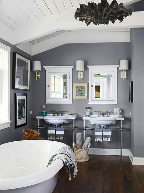 Cool Gray   Crisp White                         Contrast is the name of the game in this bathroom, where cool gray walls mingle with crisp white trim and furnishings. The rich wall color creates a luxurious environment that's perfect for relaxing after a long day. Shimmering chrome fixtures echo the wall color. Relaxing Color Schemes, Perfect Grey Paint, Dekorere Bad, Open Bathroom, Gray Walls, Bad Inspiration, Grey Room, Design Del Prodotto, Grey Bathrooms