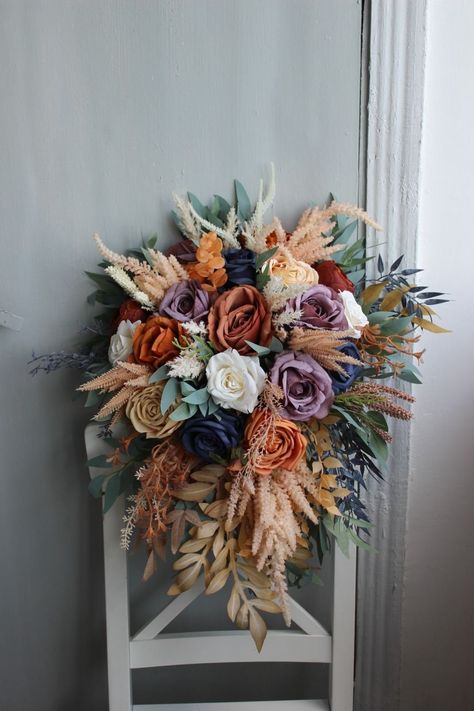 All the flowers and greenery is artificial and of high quality! Blue Orange Purple Wedding, Purple And Rust Wedding, Fall Purple Wedding Colors, Fall Purple Wedding, Navy Purple Wedding, Wedding Bouquet Cascading, Bridal Era, Purple Fall Wedding, Rose Gold Bouquet